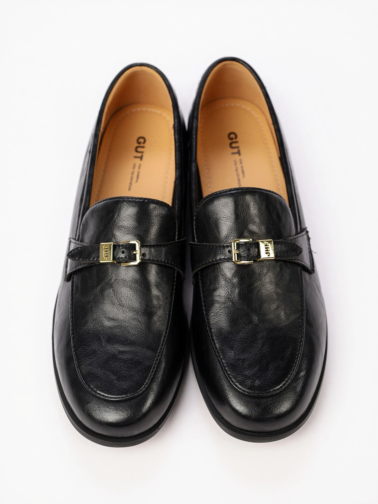 Лоферы черного цвета на венском каблуке